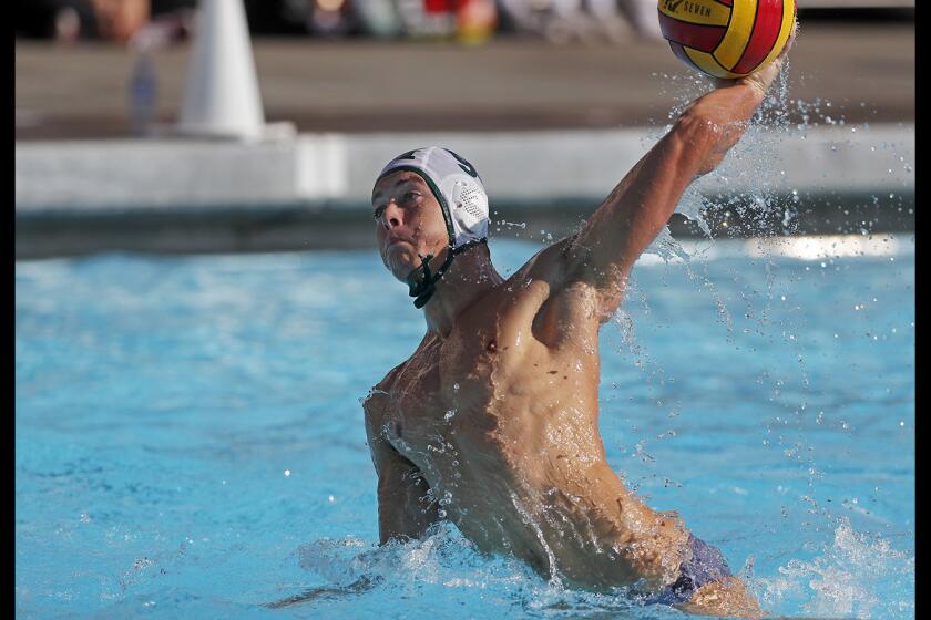 Costa Mesa High's Caedmon Fisher fires a shot during the first half against Estancia in an Orange Coast League match at Estancia High on Wednesday, Oct. 24.