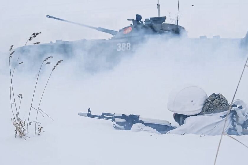 In this photo taken from video and released by the Russian Defense Ministry Press Service on Wednesday, Feb. 2, 2022, Russian soldiers attend a military training at the Yurginsky training ground in the Kemerovo region, Russia. The Russian military has launched a series of drills across the country amid the tensions with the West over Ukraine. (Russian Defense Ministry Press Service via AP)