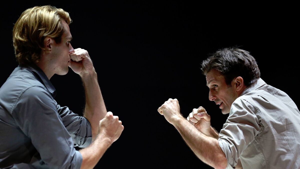 Dave Register as Rodolpho and Frederick Weller, as Eddie, in Arthur Miller's "A View from the Bridge" at the Ahmanson Theatre in downtown Los Angeles.
