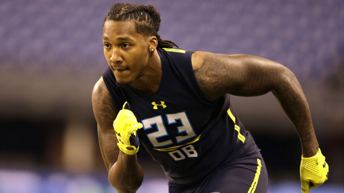Miami defensive back Rayshawn Jenkins runs the 40-yard dash at the NFL combine in March.