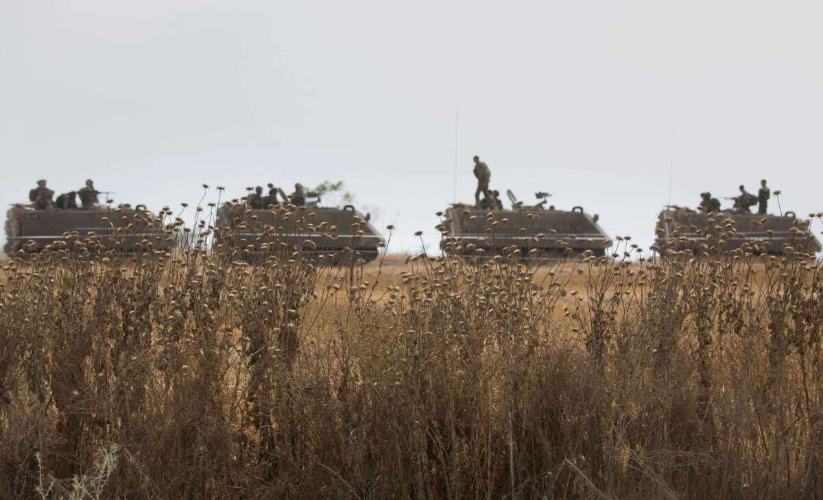 Israeli soldiers conduct a training exercise near the Israel-Gaza border on June 7.