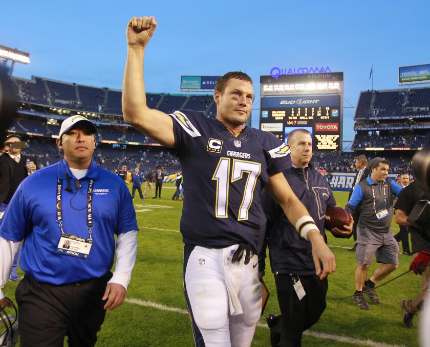 Philip Rivers salutes Chargers fans after a 2015 victory over the Miami Dolphins in San Diego.