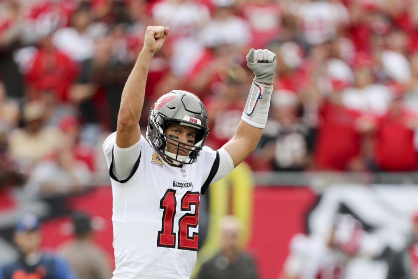 Tampa Bay quarterback Tom Brady celebrates after a touchdown during a game against the Chicago Bears on Sunday.