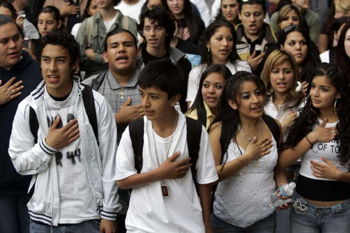 North High School students pledged Allegiance in English and Spanish during a protest for immigrant rights at Riverside City Hall on March 31, 2006. ( Gina Ferazzi / Los Angeles Times)