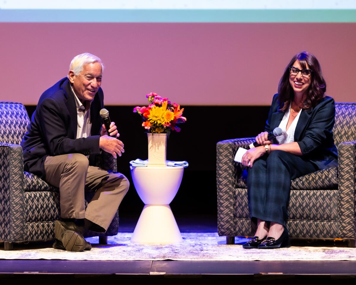 Author Walter Isaacson (left) discusses his book "Elon Musk" with columnist Anita Chabria at the Los Angeles Times Book Club 