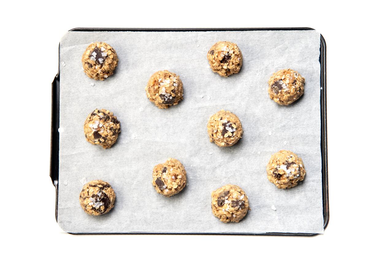 Alternate the dough balls to fit more on a pan.