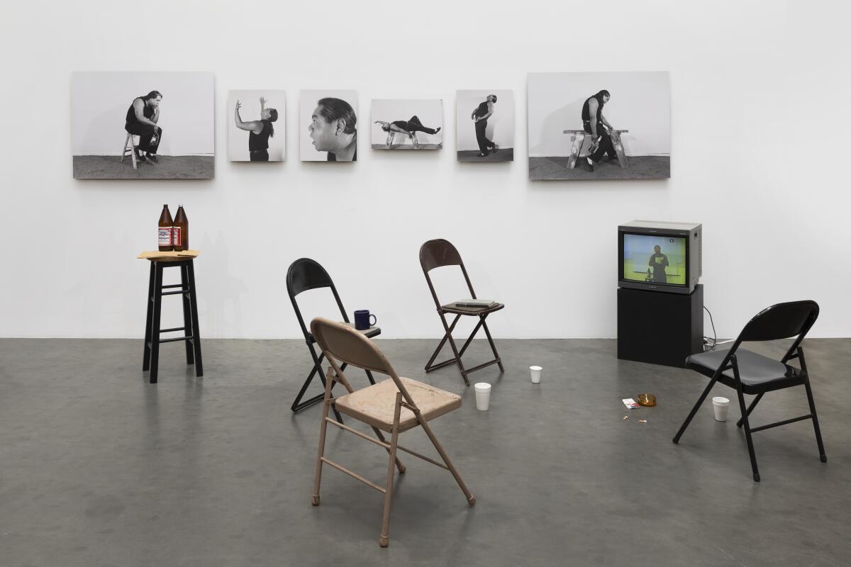 In this art installation, folding chairs are arranged in a circle, much as you might see in an Alcoholics Anonymous meeting.