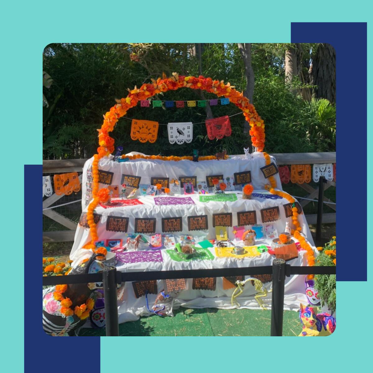 Photo of an altar decorated with paper flowers and flags
