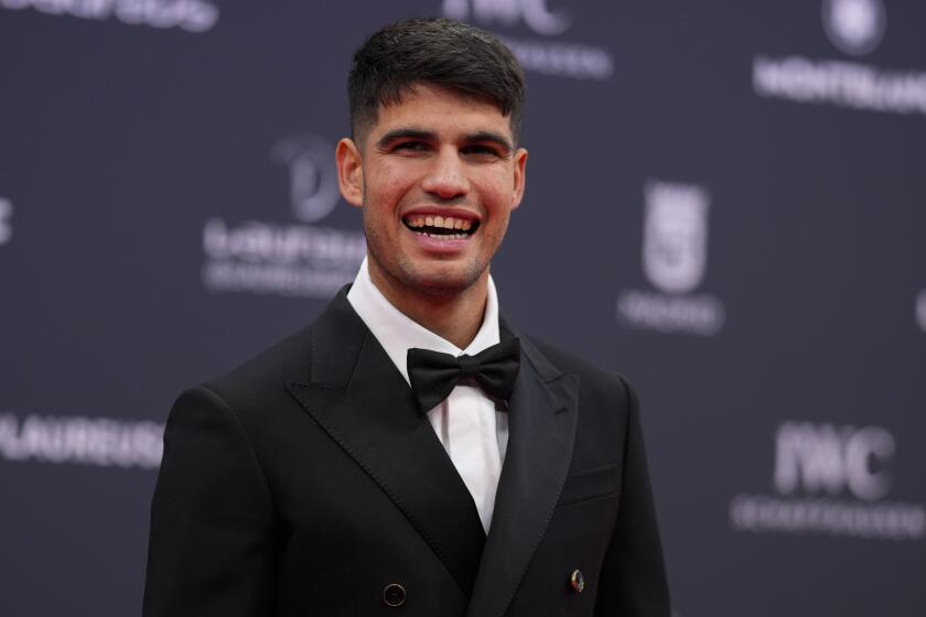 Spanish tennis player Carlos Alcaraz poses on the red carpet before the Laureus Sports Awards ceremony in Madrid, Monday, April 22, 2024. (AP Photo/Manu Fernandez)