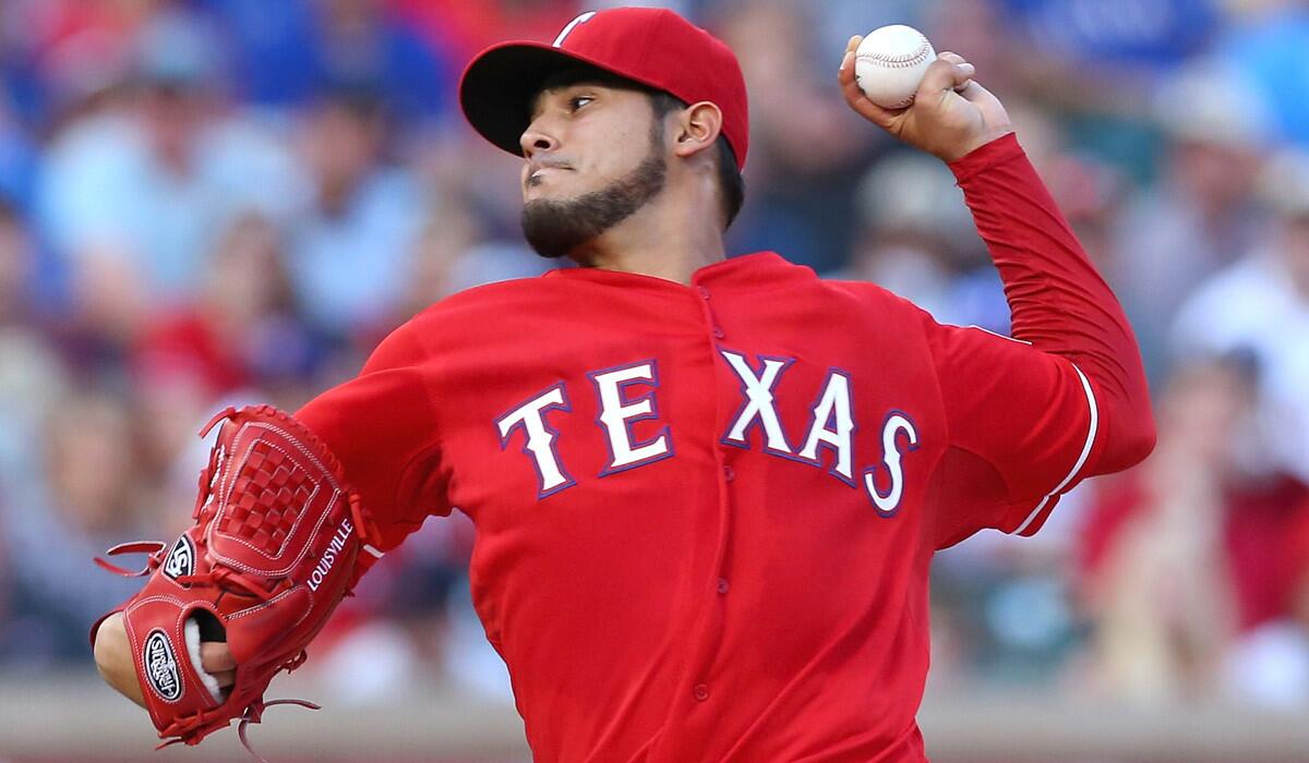 Rangers starting pitcher Martin Perez works against the Boston Red Sox during a game Saturday.