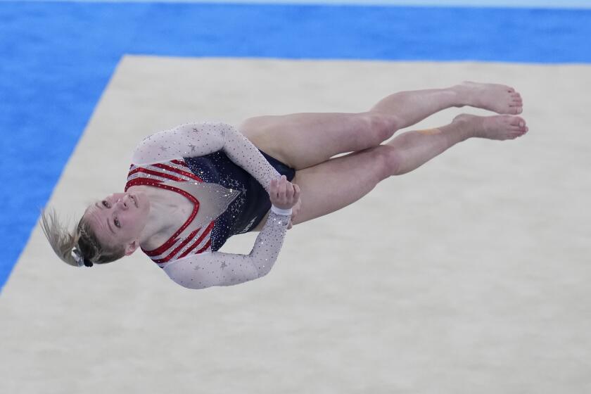 Jade Carey, of the United States, performs on the floor during the artistic gymnastics women's apparatus final at the 2020 Summer Olympics, Monday, Aug. 2, 2021, in Tokyo, Japan. (AP Photo/Gregory Bull)