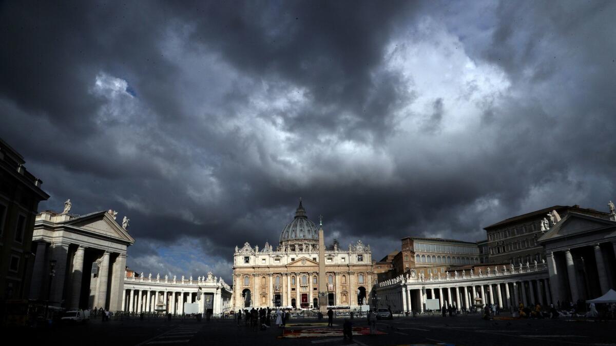 Clouds hang over St. Peter's Basilica, at the Vatican, Thursday, June 29, 2017.