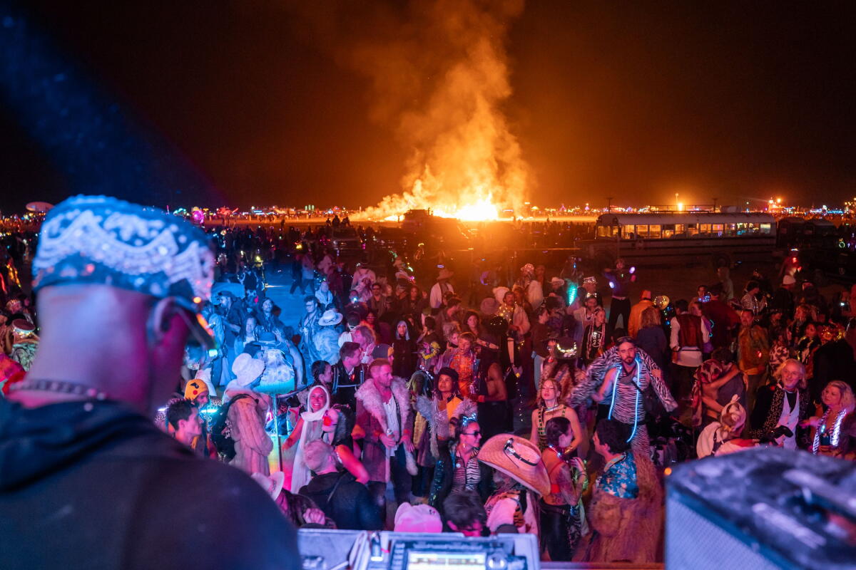 Burnt Man Rapper Commentary: Dancing in rain and mud relighted Burning Man's fire - Los ...