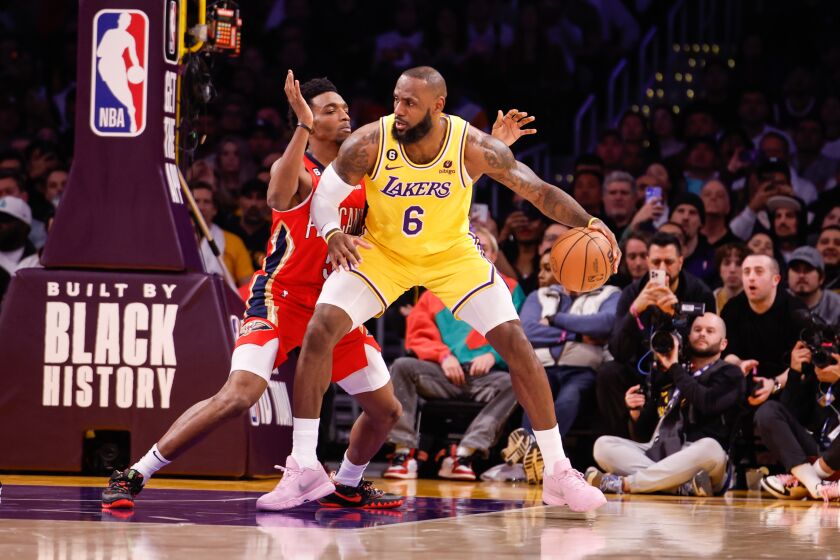 LOS ANGELES, CA - FEBRUARY 15: Los Angeles Lakers forward LeBron James (6) drives against a Pelican defender as the Lakers play the Pelicans at Crypto.com arena on Wednesday, Feb. 15, 2023 in Los Angeles, CA. (Jason Armond / Los Angeles Times)
