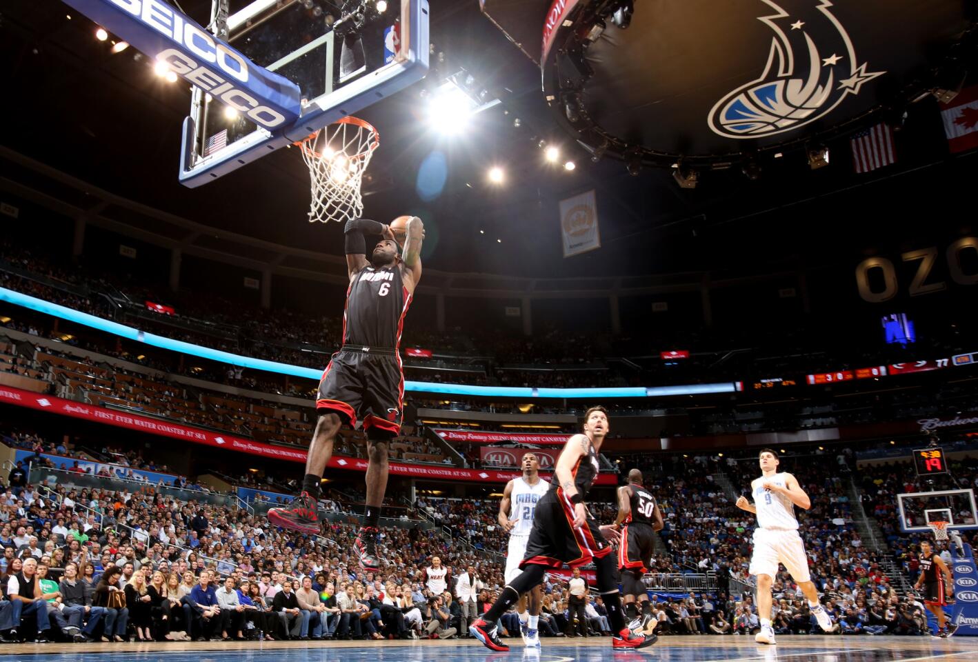 Miami forward LeBron James (6) dunks off a fast break during the second half of the Heat's 112-110 overtime victory over the Orlando Magic in Orlando, Fla.