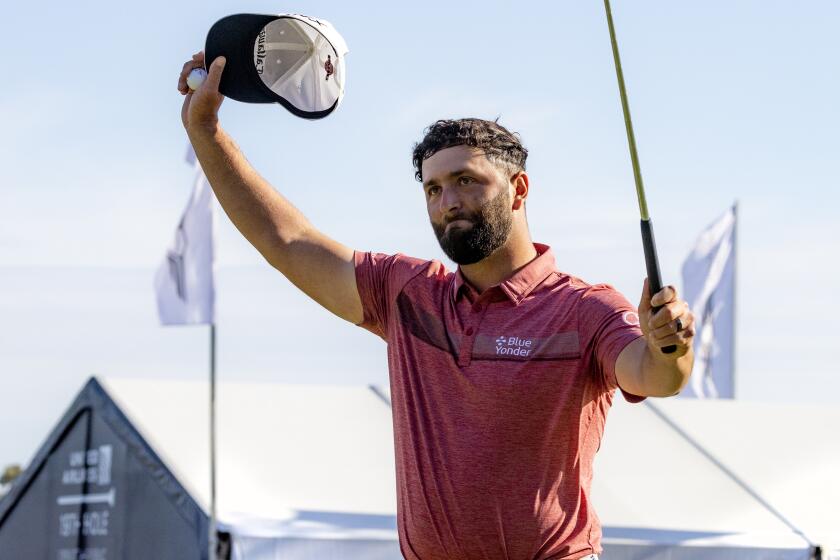 PACIFIC PALISADES, CA - FEBRUARY 19, 2023: Jon Rahm acknowledges the crowd after winning the Genesis Invitational.