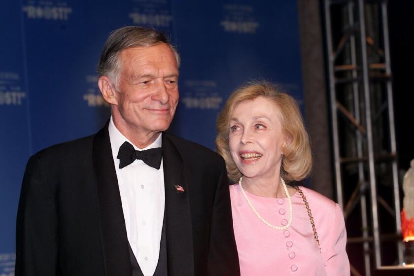 Joyce Brothers, seen here in 2001 with Hugh Hefner, was not only a psychologist and columnist but also a popular movie and TV actress, often appearing as herself.