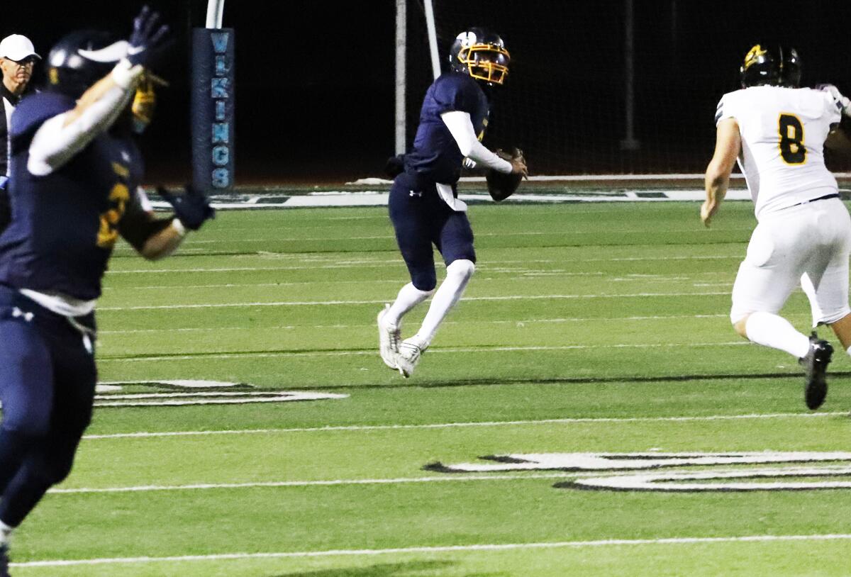 Marina quarterback Garrett Hunnicut (3) looks for an open receiver against Sunny Hills on Friday.