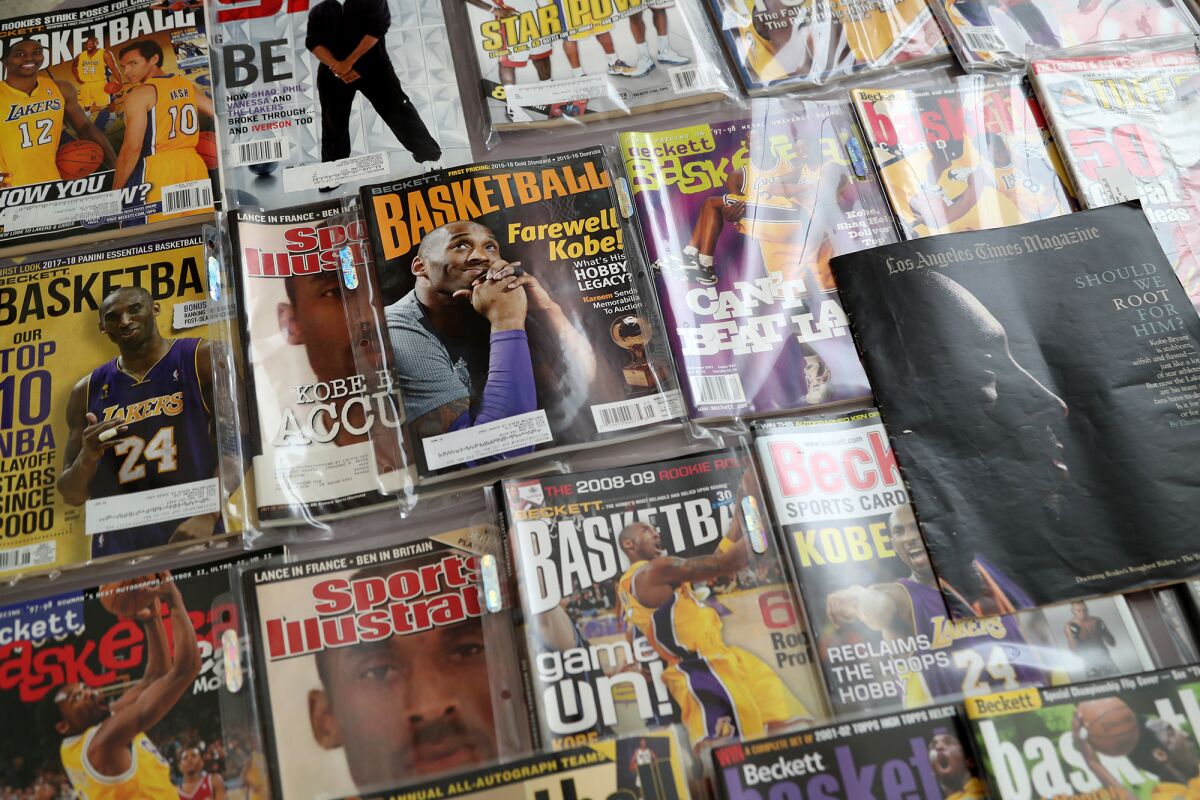 Magazine covers of Lakers legend Kobe Bryant are on display in the Kolosow family home in Huntington Beach.