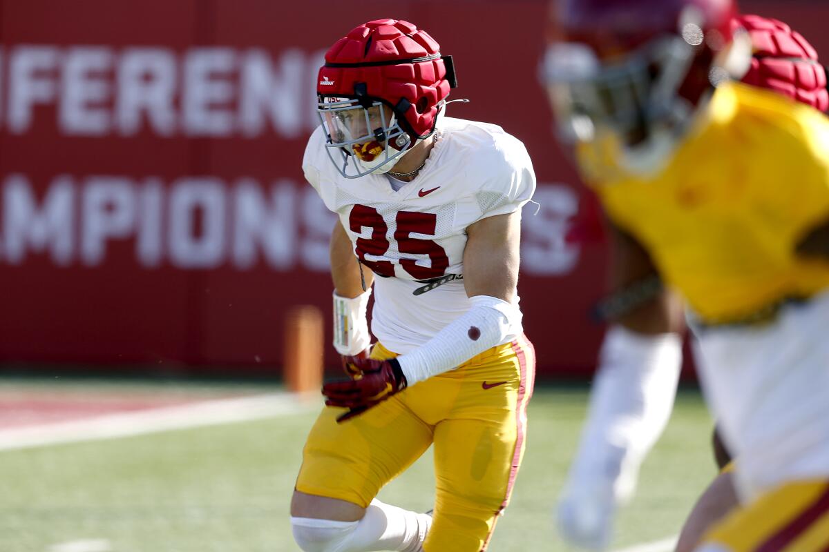 USC linebacker Tackett Curtis runs on the field during a spring football practice