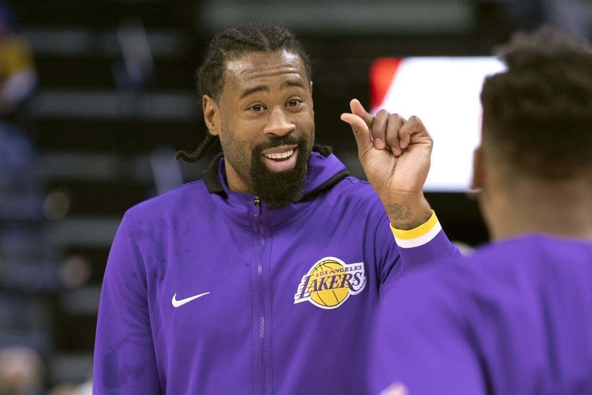 Lakers center DeAndre Jordan gestures to a teammate.