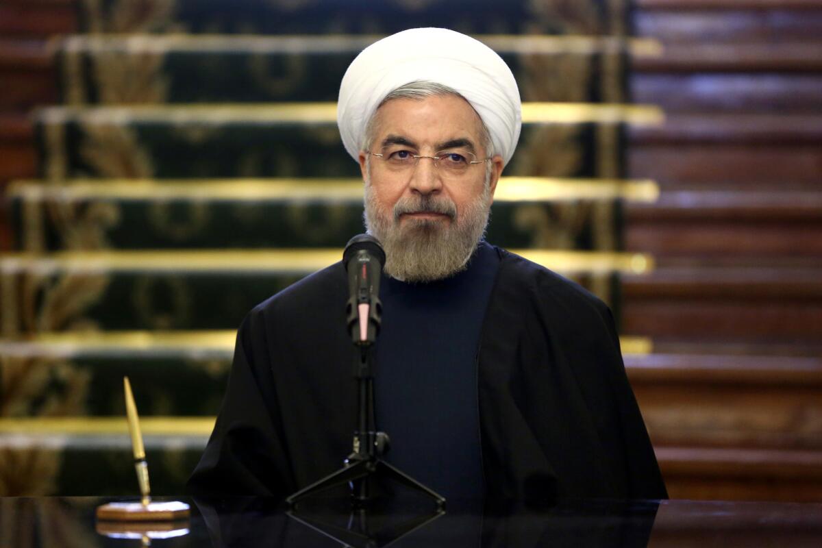 Iranian President Hassan Rouhani attends a press conference in Tehran.