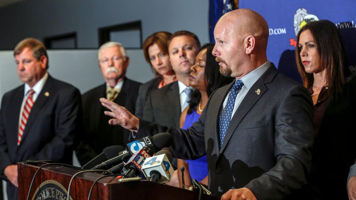 Jamie McBride, a Los Angeles police detective and a director of Los Angeles Police Protective League, speaks at a news conference last year. A jury awarded McBride $1.5 million in his lawsuit alleging he was the victim of retaliation by the department.