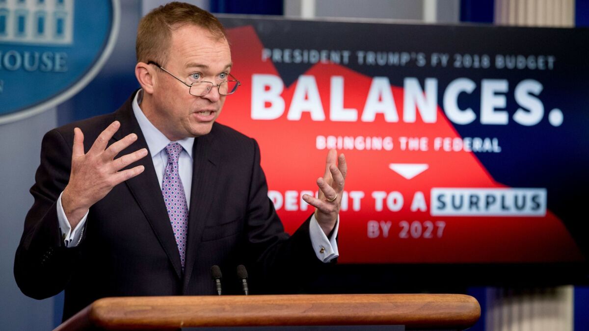 Budget Director Mick Mulvaney speaks to the media about President Trump's proposed 2018 budget at a White House news briefing Tuesday.