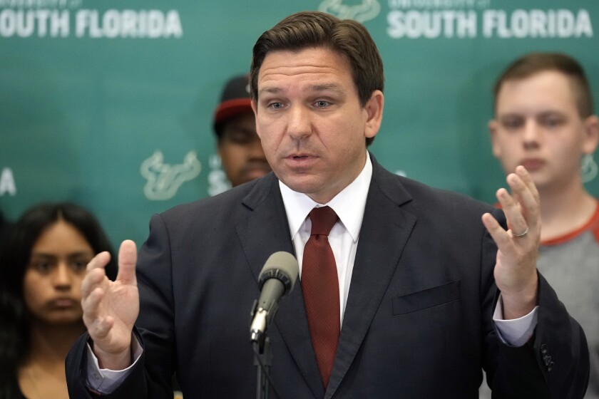 Florida Gov. Ron DeSantis speaks during a news conference after announcing a $20 million dollar program to create cybersecurity opportunities through the Florida Center for Cybersecurity at the University of South Florida Wednesday, March 2, 2022, in Tampa, Fla. (AP Photo/Chris O'Meara)