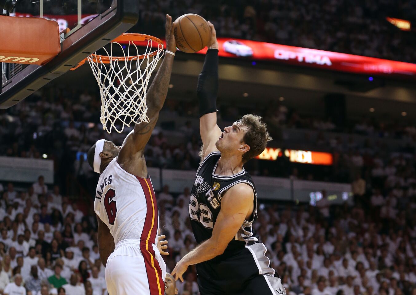 Block party: LeBron James of the Miami Heat blocks the shot of Tiago Splitter of the San Antonio Spurs in the fourth quarter during Game 2 of the 2013 NBA Finals at American Airlines Arena in Miami.