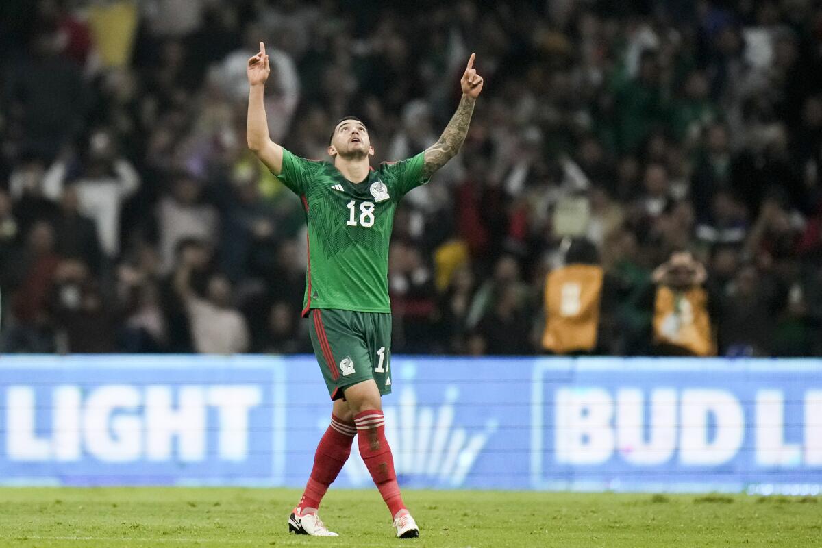 Mexico's Luis Chavez celebrates scoring his si 