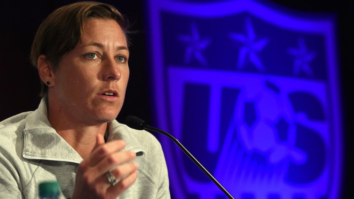 Abby Wambach addresses the media during a news conference in New York City on May 27.