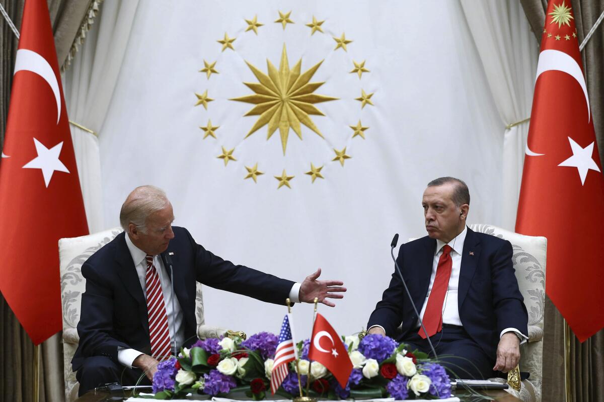 FILE - In this Aug. 24, 2016, file photo, U.S. Vice President Joe Biden, left, and Turkish President Recep Tayyip Erdogan speak to the media after a meeting in Ankara, Turkey. Biden and Turkish counterpart Erdogan have known each other for years, but their meeting Monday, June 14, 2021, will be their first as heads of state. And it comes at a particularly tense moment for relations between their two countries. (Kayhan Ozer/Presidential Press Service Pool via AP, File)