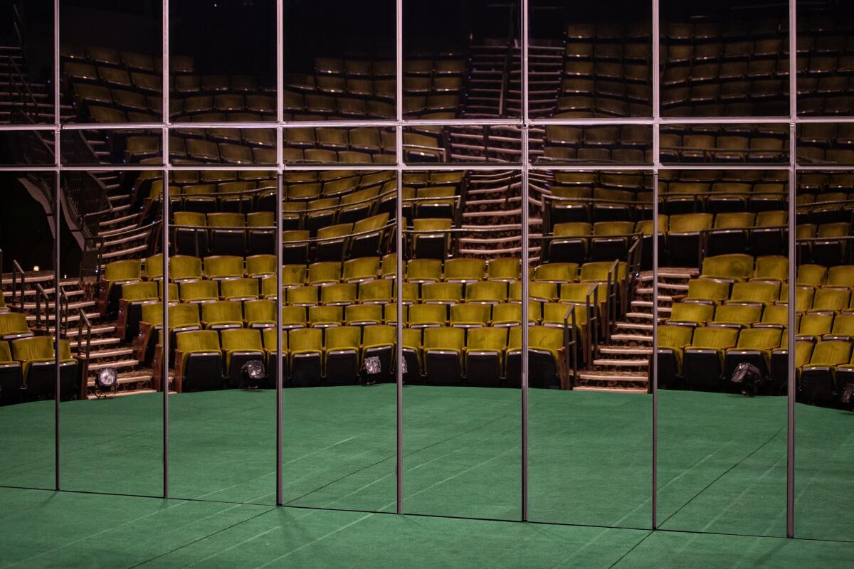 The seats in Mark Taper Forum reflected in the mirrored set of 'Slave Play' in 2022