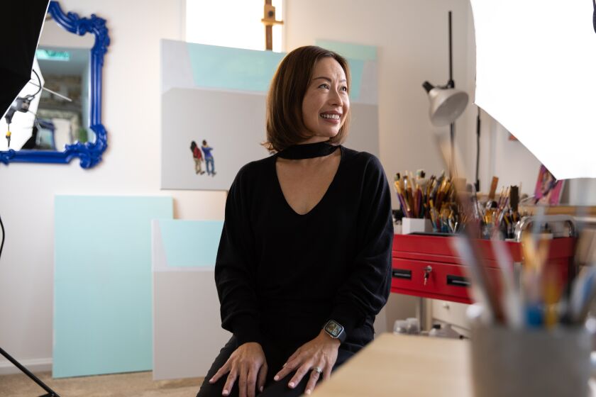 San Diego, CA - December 14: Artist Cecilia Wong Kaiser poses for a portrait at her home in Rancho Santa Fe in San Diego, CA on Wednesday, Dec. 14, 2022. Wong Kaiser will be showcasing "Blue Sky," an exhibition of paintings at BFREE Studio in La Jolla starting in January 2023. (Adriana Heldiz / The San Diego Union-Tribune)