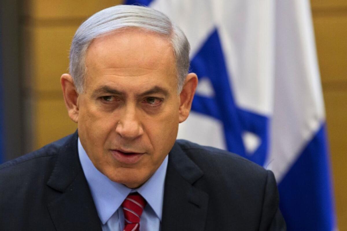 Israeli Prime Minister Benjamin Netanyahu speaks during a faction meeting at the Knesset last December. On Tuesday, Netanyahu will address Congress on Iran.
