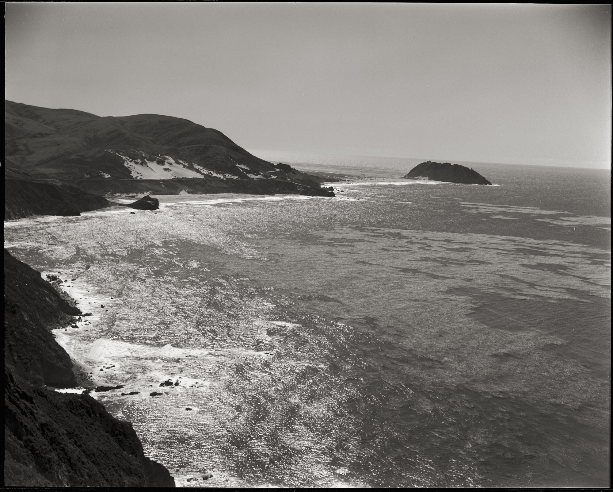 A historic black and white photo of a coastline from 1967.