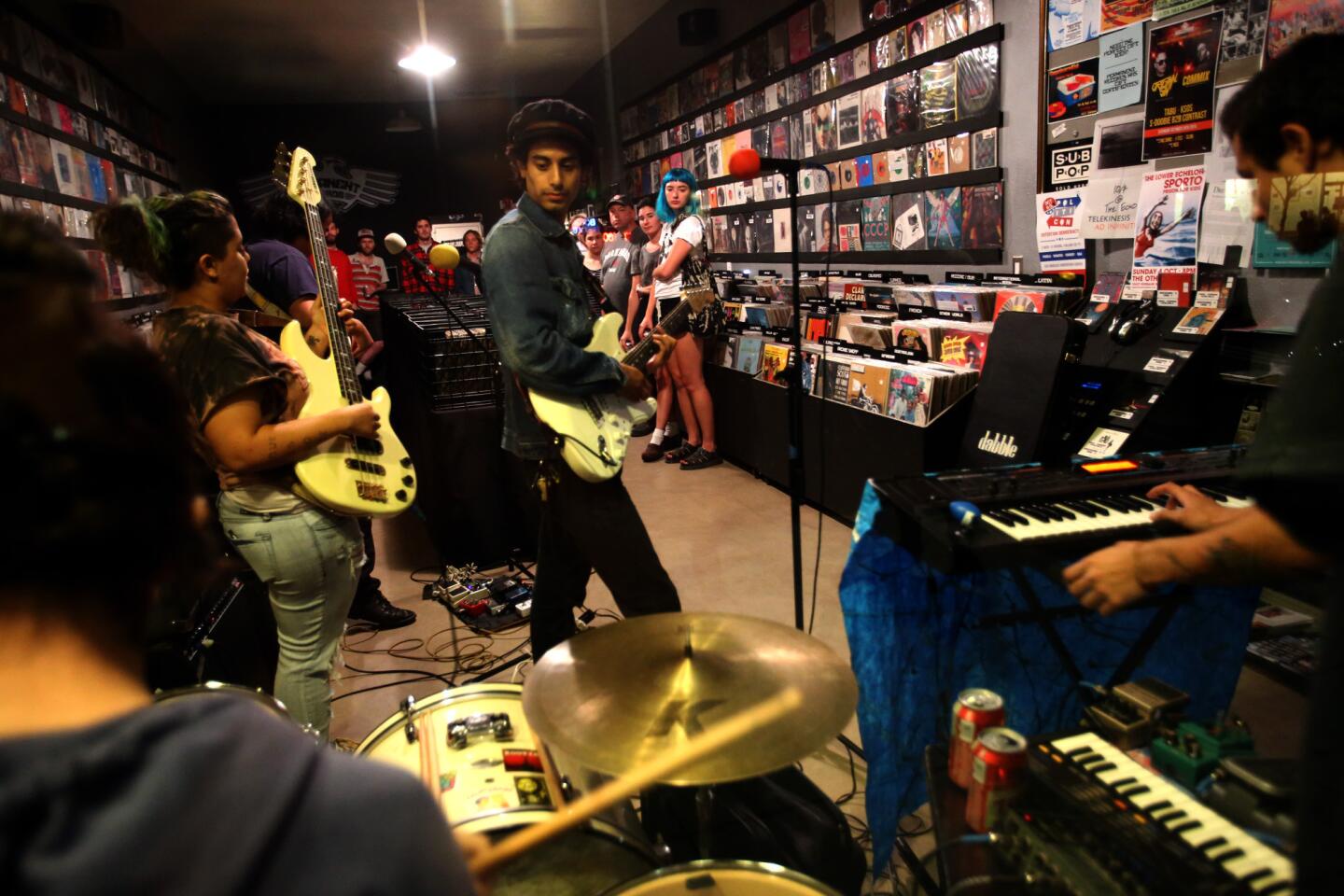 The Southern California band Dabble performs inside Permanent Records on York Avenue in Highland Park.