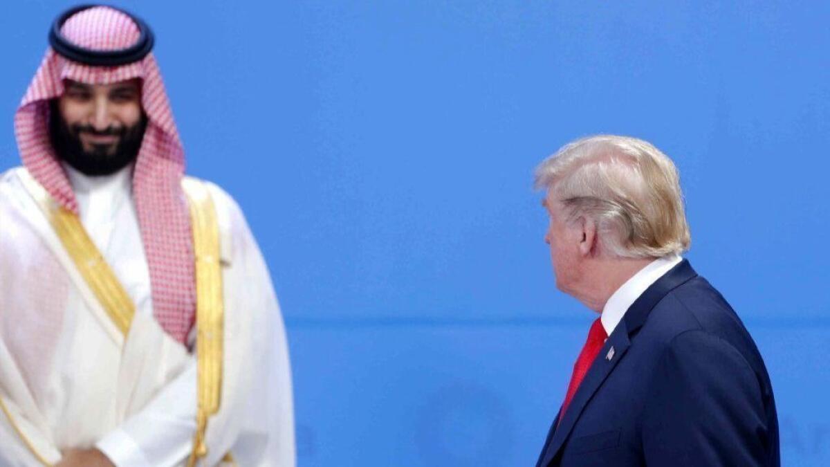 President Trump looks over at Saudi Crown Prince Mohammed bin Salman during the opening day of the G-20 summit in Argentina.