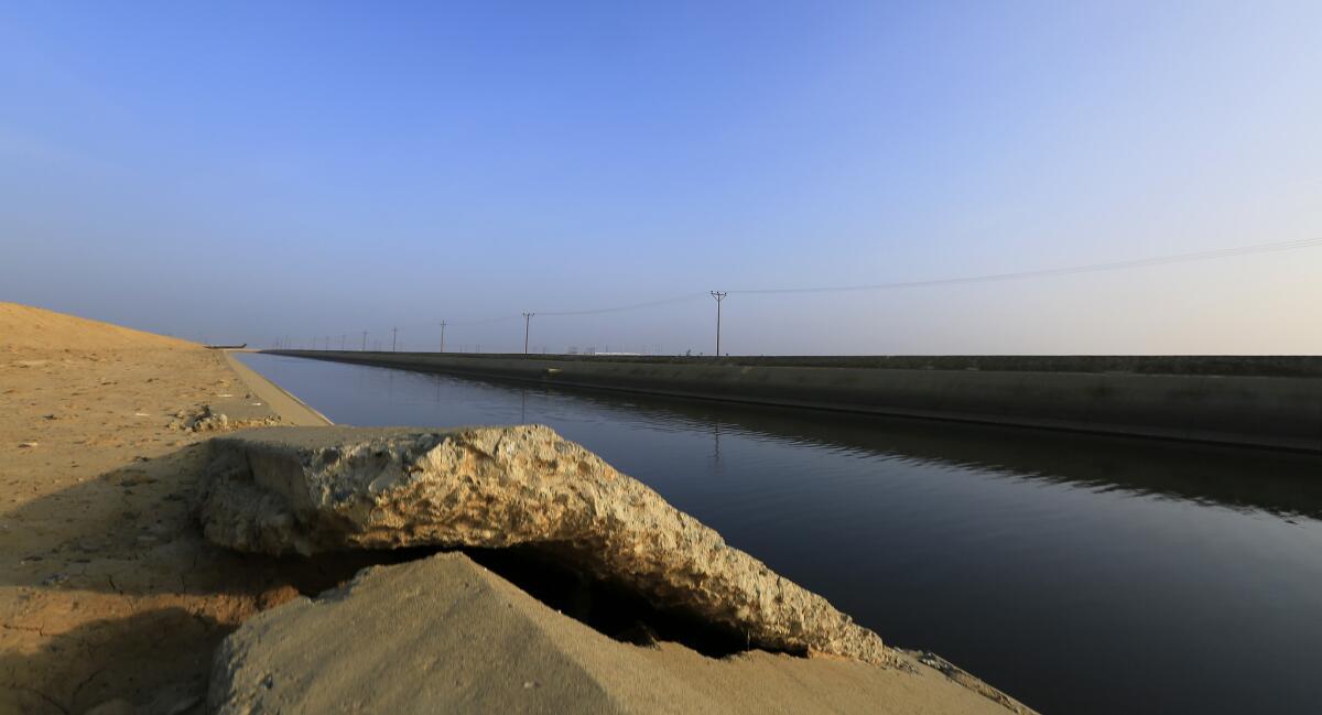 Many of the groundwater basins in the San Joaquin Valley are stressed, according to a new state report. Above, cracked concrete on the Delta Mendota Canal near Los Banos, where the land is sinking.