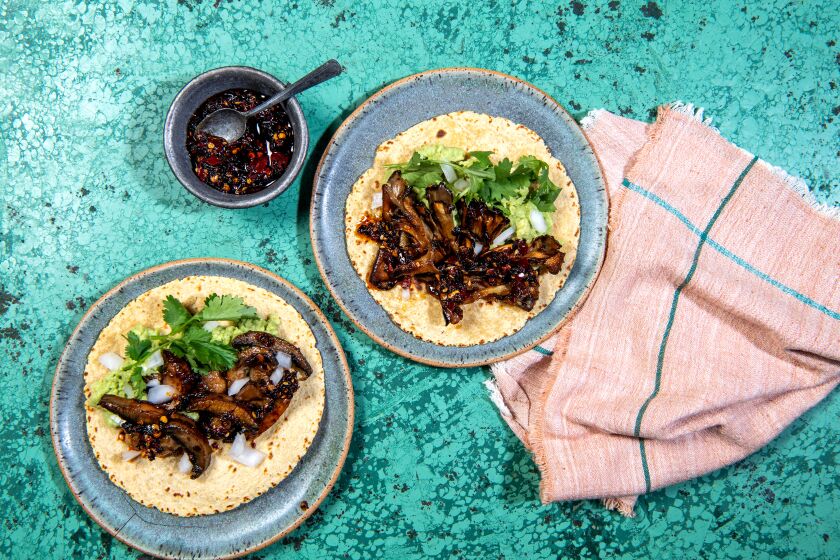You can make these tacos with sliced button mushrooms, left, or maitakes.
