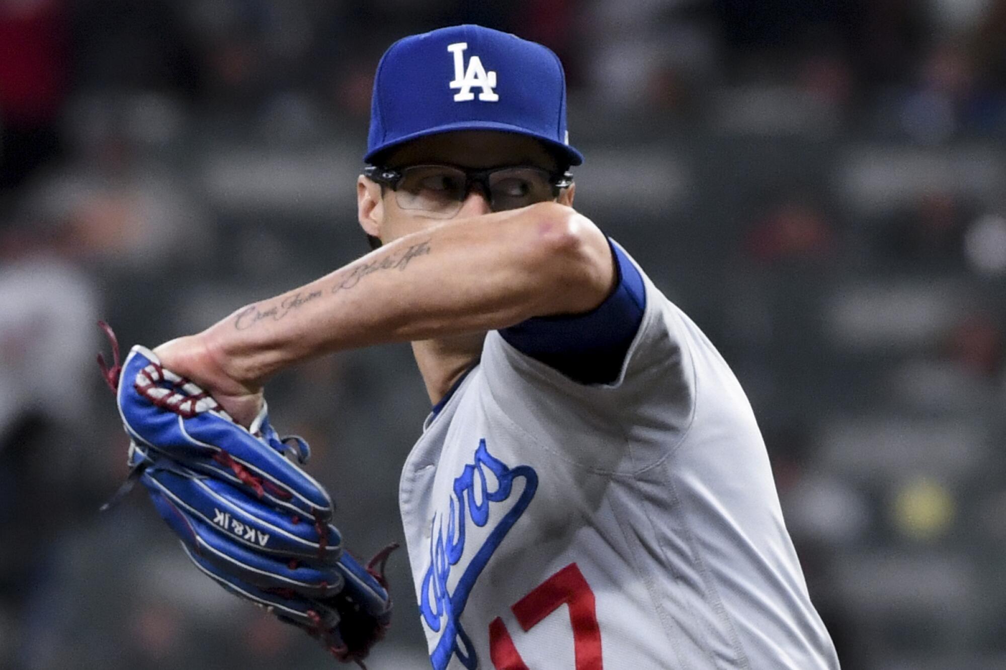 Los Angeles Dodgers relief pitcher Joe Kelly delivers a pitch