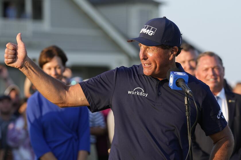 FILE - Phil Mickelson speaks after winning the PGA Championship golf tournament on the Ocean Course, May 23, 2021, in Kiawah Island, S.C. Mickelson has not been heard from in three months. It is uncertain if he will defend his title at Southern Hills on May 19-22. (AP Photo/David J. Phillip, File)