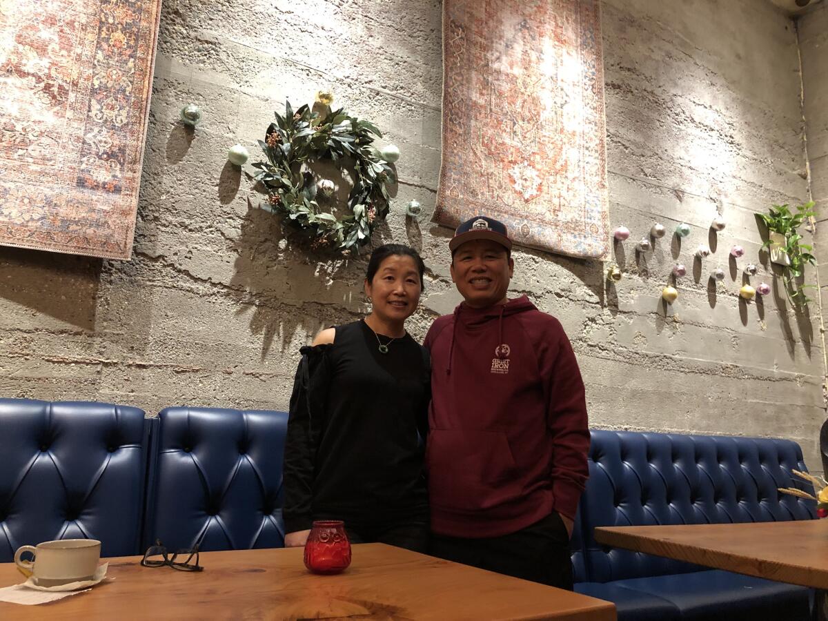Brian Wong and his wife, Louisa Louie, at Union Bar & Grill, one of two restaurants they own in Oroville.