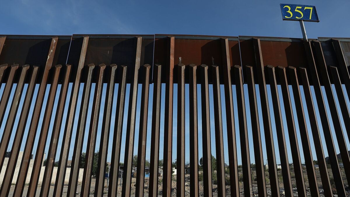 The U.S.-Mexico border fence in Sunland Park, N.M., in July.