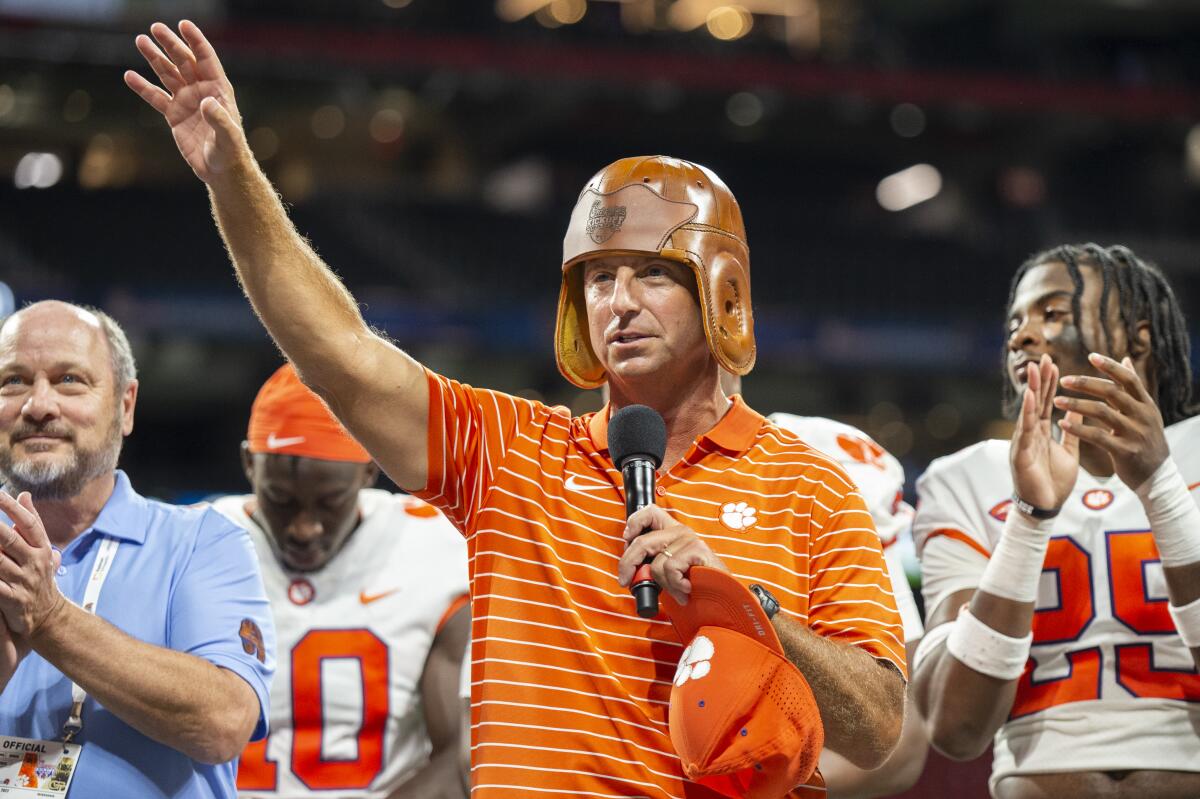 Clemson Tigers head coach Dabo Swinney wears the leather hat after victory over Georgia Tech in an NCAA college football game Monday, Sept. 5, 2022, in Atlanta. (AP Photo/Hakim Wright Sr.)