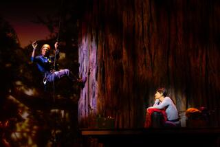 Two women near a redwood tree in the musical "Redwood."