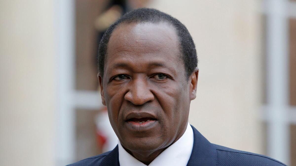 In 2012, Burkina Faso President Blaise Compaore speaks to the media after a meeting with French President Francois Hollande in Paris.