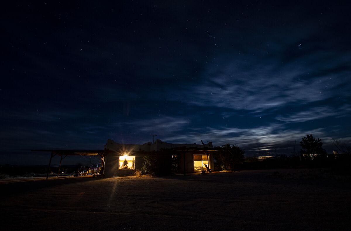 A cloudy sky covers the moonrise at the Creosote House in Joshua Tree, part of Wild Up's "darkness sounding" series.