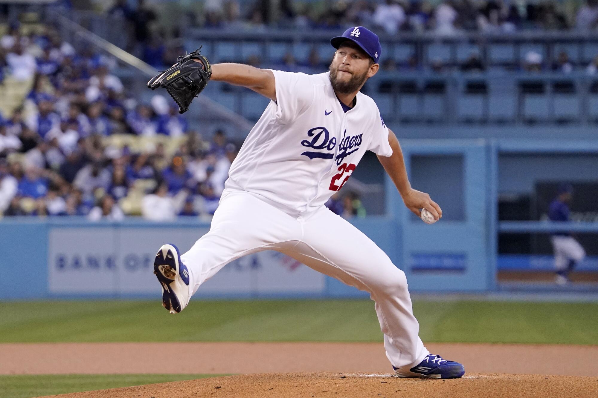 Los Angeles Dodgers starting pitcher Clayton Kershaw throws to the plate during the first inning.